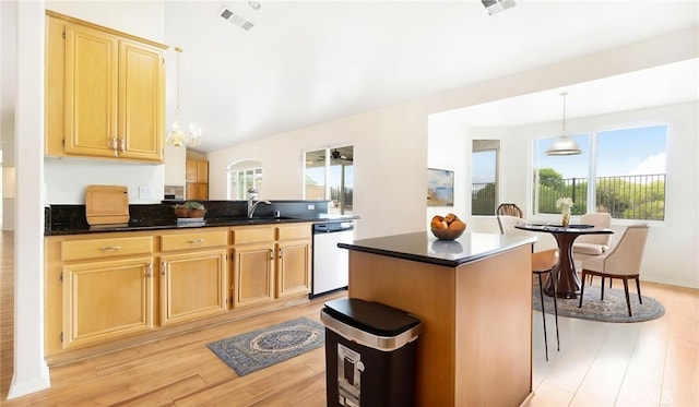 13912 Riverside Dr, Apple Valley, CA 92307 - kitchen with light wood finished floors, a wealth of natural light, and dishwasher