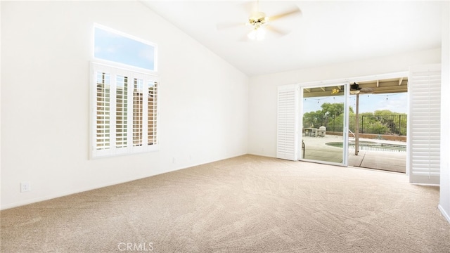 13912 Riverside Dr, Apple Valley, CA 92307 - carpeted spare room with vaulted ceiling and ceiling fan