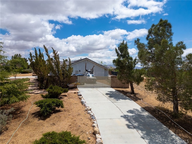 13912 Riverside Dr, Apple Valley, CA 92307 - view of front facade with a gate and fence private yard