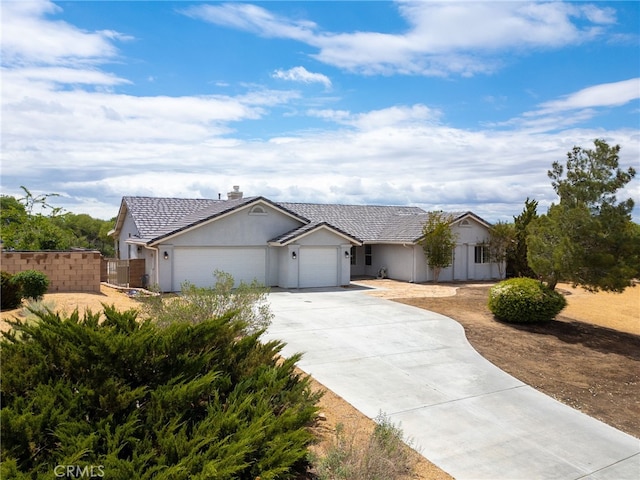 13912 Riverside Dr, Apple Valley, CA 92307 - ranch-style home featuring fence, driveway, a garage, stucco siding, and a chimney