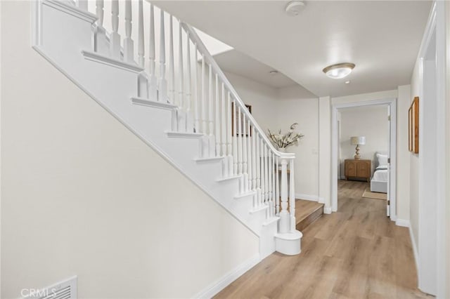 13031 Villosa Pl Unit 437, Playa Vista, CA 90094 - foyer featuring light wood finished floors, baseboards, and stairs