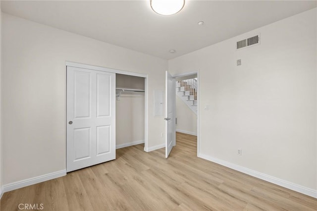 13031 Villosa Pl Unit 437, Playa Vista, CA 90094 - unfurnished bedroom featuring baseboards, a closet, light wood-style flooring, and visible vents