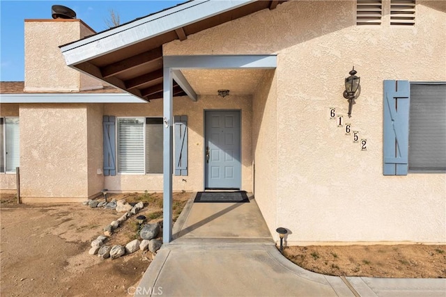 61652 Pueblo Trl, Joshua Tree, CA 92252 - doorway to property featuring stucco siding
