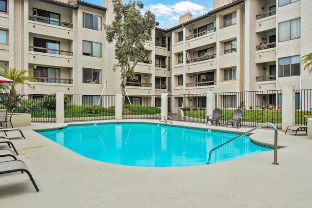 5745 Friars Rd Unit 116, San Diego, CA 92110 - pool featuring fence