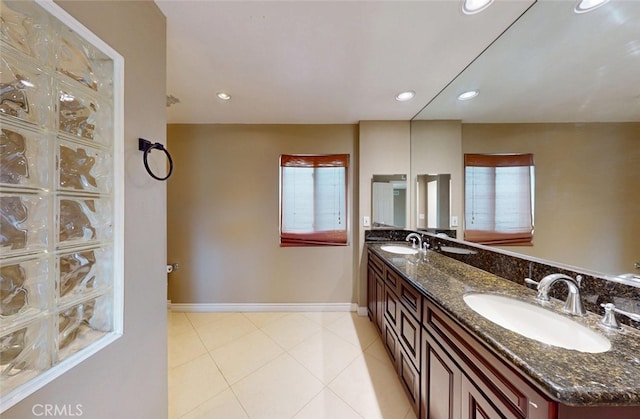 25211 Barents, Laguna Hills, CA 92653 - bathroom featuring tile patterned floors, double vanity, baseboards, and a sink