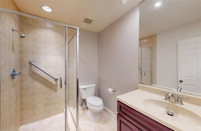 25211 Barents, Laguna Hills, CA 92653 - bathroom featuring toilet, a stall shower, visible vents, vanity, and recessed lighting