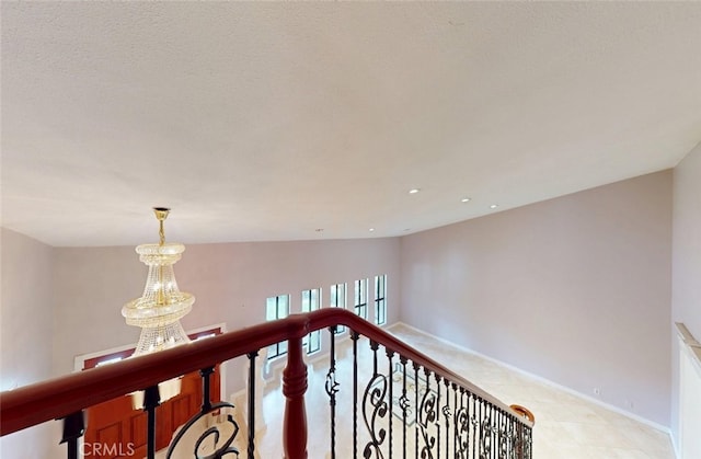 25211 Barents, Laguna Hills, CA 92653 - hallway with a chandelier, baseboards, an upstairs landing, and recessed lighting