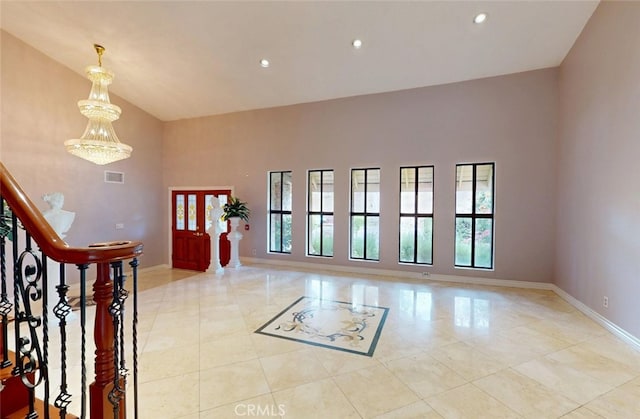 25211 Barents, Laguna Hills, CA 92653 - foyer entrance with high vaulted ceiling, visible vents, baseboards, light tile patterned flooring, and recessed lighting