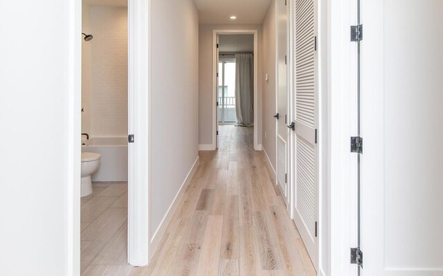 3341 Tyler St, Carlsbad, CA 92008 - hall with light wood-style flooring, recessed lighting, and baseboards