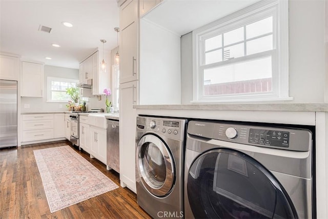 516 S Sparks St S, Burbank, CA 91506 - laundry room featuring recessed lighting, dark wood-style flooring, washer and dryer, visible vents, and laundry area