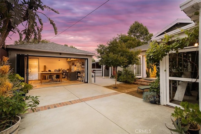 516 S Sparks St S, Burbank, CA 91506 - back of property at dusk with a patio area and stucco siding