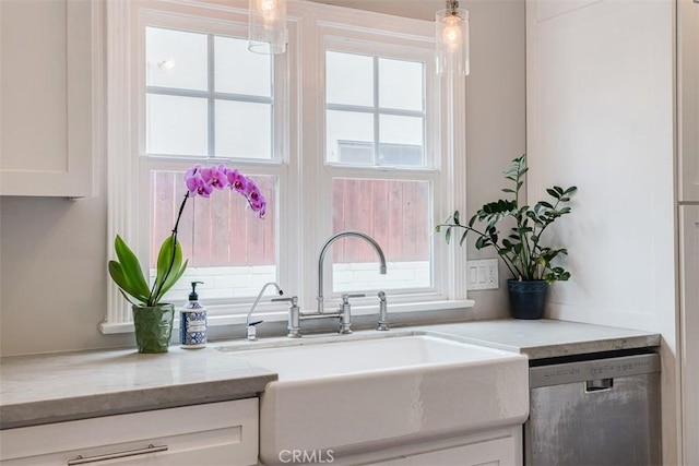 516 S Sparks St S, Burbank, CA 91506 - kitchen with a sink, stainless steel dishwasher, white cabinetry, and a healthy amount of sunlight
