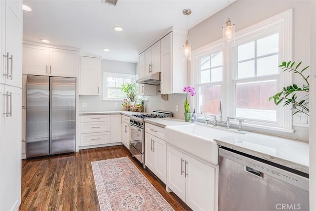 516 S Sparks St S, Burbank, CA 91506 - kitchen with a sink, stainless steel appliances, pendant lighting, white cabinetry, and dark wood-style floors