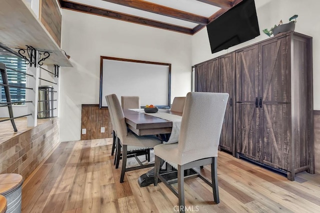 583 Arbula Dr, Crestline, CA 92325 - dining room with light wood-type flooring and beam ceiling