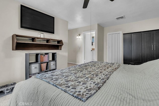 583 Arbula Dr, Crestline, CA 92325 - carpeted bedroom with baseboards and a ceiling fan