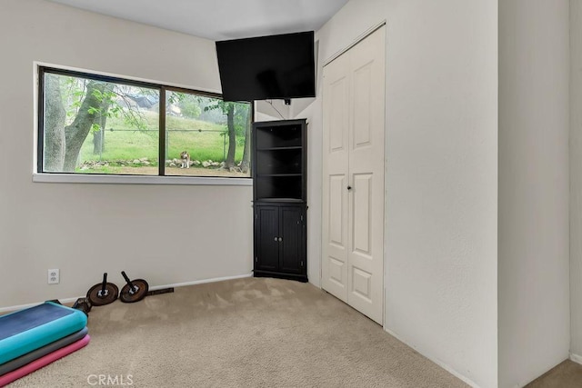 583 Arbula Dr, Crestline, CA 92325 - unfurnished bedroom with carpet, a closet, and baseboards