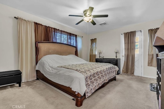 583 Arbula Dr, Crestline, CA 92325 - bedroom with light carpet, a ceiling fan, and baseboards