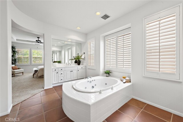 bathroom with vanity, a whirlpool tub, tile patterned floors, a ceiling fan, and recessed lighting
