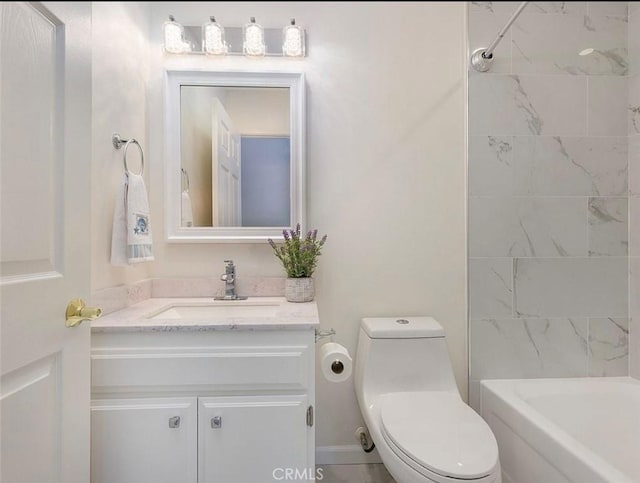 bathroom with toilet and vanity