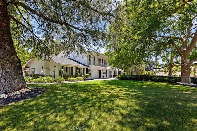 2141 Westminster Dr, Riverside, CA 92506 - rear view of house featuring a yard