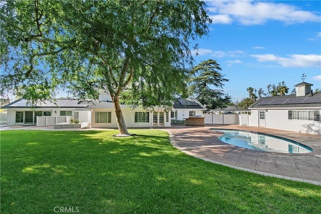 2141 Westminster Dr, Riverside, CA 92506 - rear view of property with french doors, an outdoor living space, a patio, and solar panels