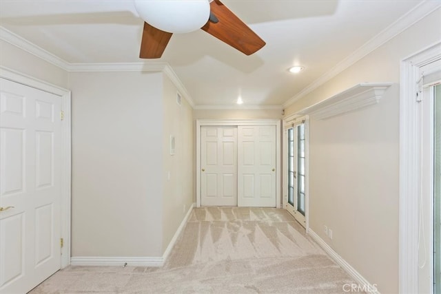 2141 Westminster Dr, Riverside, CA 92506 - entryway featuring light carpet, crown molding, baseboards, a ceiling fan, and recessed lighting