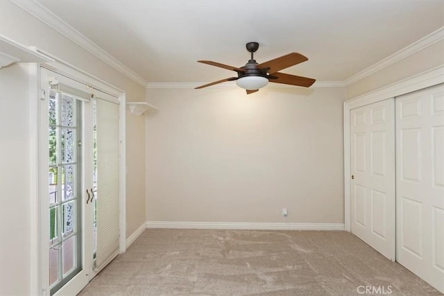 2141 Westminster Dr, Riverside, CA 92506 - unfurnished bedroom with ornamental molding, carpet floors, baseboards, a closet, and ceiling fan