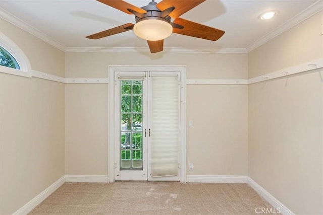 2141 Westminster Dr, Riverside, CA 92506 - carpeted spare room with crown molding, a ceiling fan, and baseboards