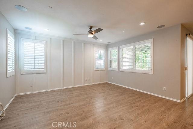 24189 Darmera Dr, Lake Elsinore, CA 92532 - unfurnished room featuring a ceiling fan, wood finished floors, baseboards, and recessed lighting