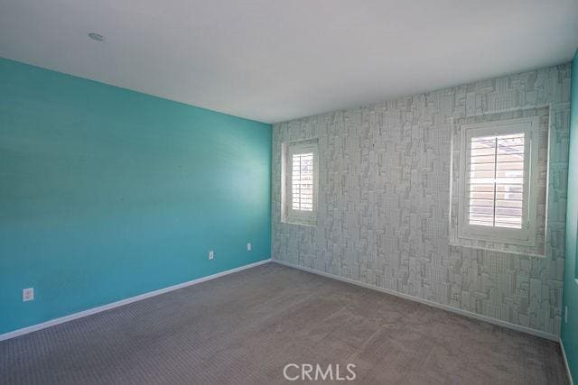 24189 Darmera Dr, Lake Elsinore, CA 92532 - spare room featuring baseboards and carpet floors