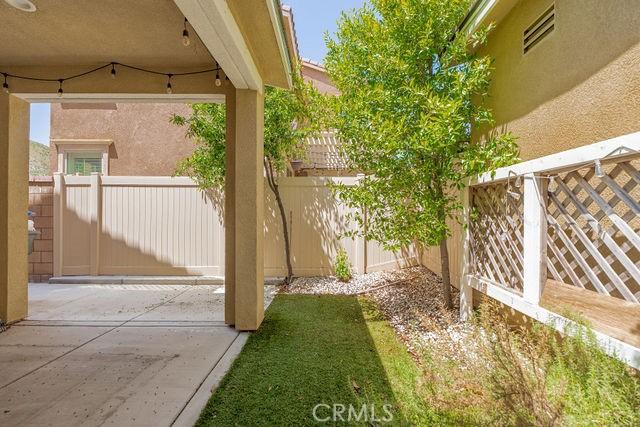 24189 Darmera Dr, Lake Elsinore, CA 92532 - view of yard with fence and a patio