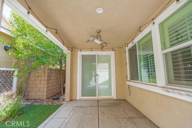 24189 Darmera Dr, Lake Elsinore, CA 92532 - view of patio featuring fence