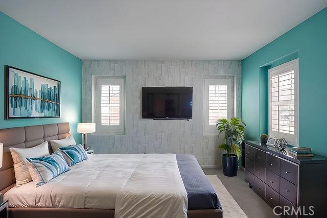 24189 Darmera Dr, Lake Elsinore, CA 92532 - bedroom with an accent wall and multiple windows