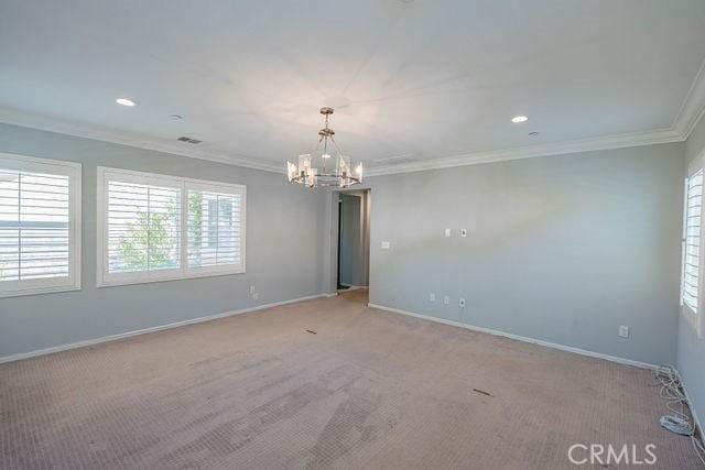 24189 Darmera Dr, Lake Elsinore, CA 92532 - empty room featuring a chandelier, ornamental molding, carpet floors, baseboards, and recessed lighting
