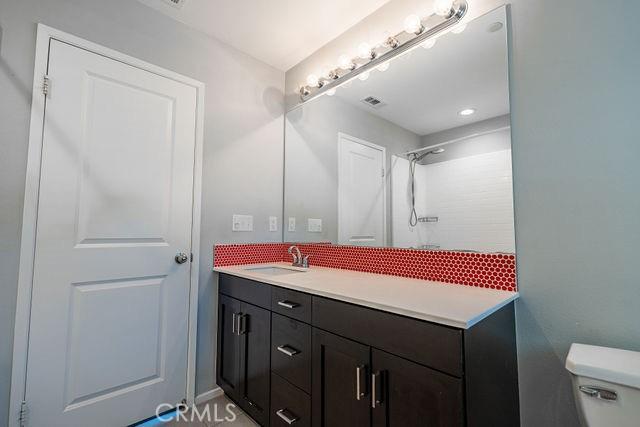 24189 Darmera Dr, Lake Elsinore, CA 92532 - bathroom featuring vanity and toilet