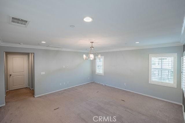 24189 Darmera Dr, Lake Elsinore, CA 92532 - spare room with crown molding, baseboards, a chandelier, light colored carpet, and recessed lighting