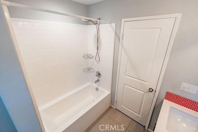 24189 Darmera Dr, Lake Elsinore, CA 92532 - bathroom featuring shower / tub combination and tile patterned floors