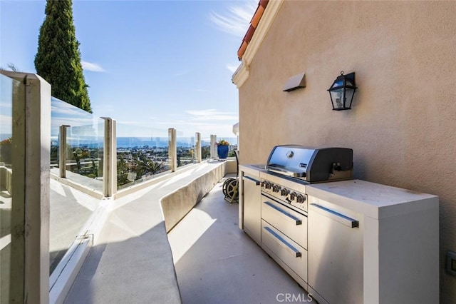 view of patio with exterior kitchen and grilling area