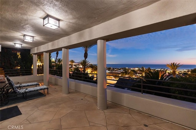 view of patio / terrace with a balcony
