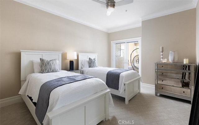 bedroom with crown molding, baseboards, and a ceiling fan