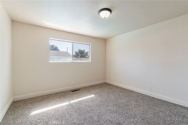 2738 S Fairway Ct, Visalia, CA 93277 - spare room featuring carpet, baseboards, and visible vents