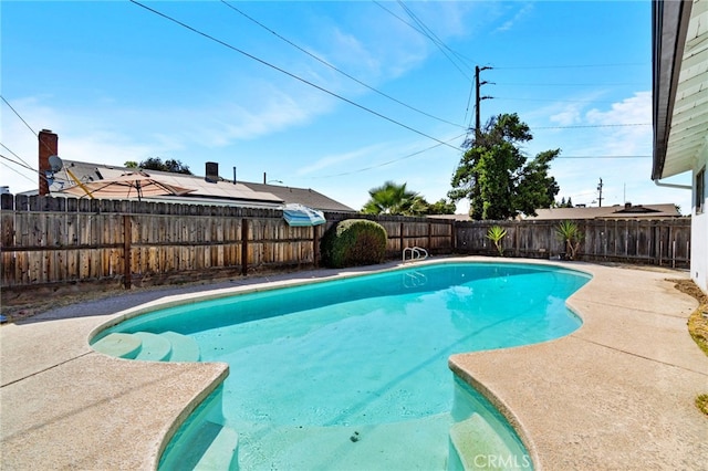 2738 S Fairway Ct, Visalia, CA 93277 - view of swimming pool with a patio area, a fenced in pool, and a fenced backyard