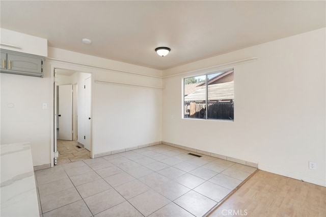 2738 S Fairway Ct, Visalia, CA 93277 - spare room featuring baseboards