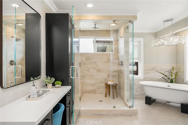 32491 Seven Seas Dr, Dana Point, CA 92629 - bathroom with a stall shower, crown molding, vanity, and a freestanding tub