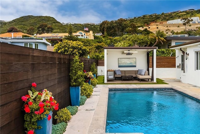 32491 Seven Seas Dr, Dana Point, CA 92629 - view of pool featuring a patio area, a mountain view, a fenced backyard, a fenced in pool, and outdoor lounge area