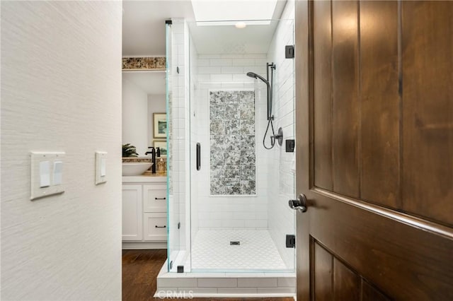 32491 Seven Seas Dr, Dana Point, CA 92629 - full bath featuring a stall shower, vanity, and wood finished floors
