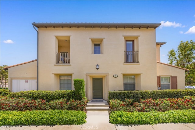 71 Nature, Irvine, CA 92620 - view of front of home featuring stucco siding