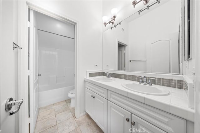 71 Nature, Irvine, CA 92620 - bathroom featuring toilet, double vanity, and shower / bathtub combination