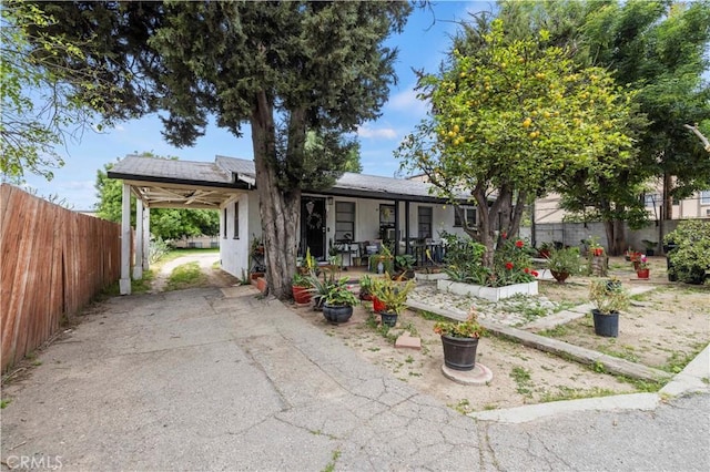 14020 Foothill Blvd, Sylmar, CA 91342 - ranch-style house featuring a porch and fence