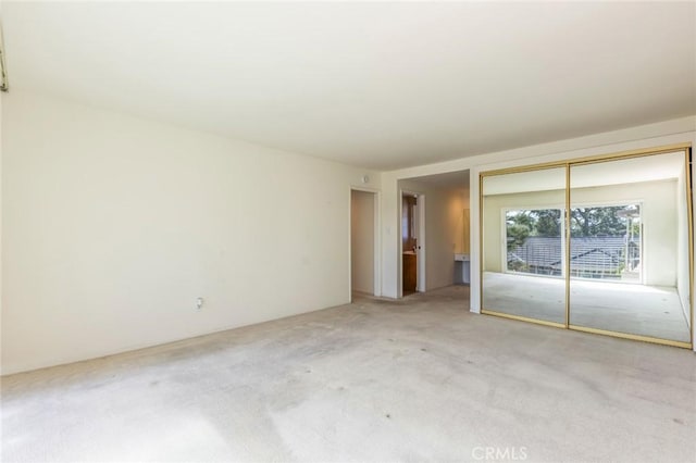 23026 Nadine Cir Unit B, Torrance, CA 90505 - unfurnished bedroom featuring carpet flooring and a closet